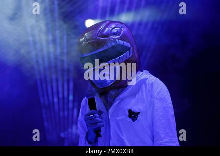 Gruff Rhys, lead singer and guitarist of the Welsh rock band the Super Furry Animals, wears an oversized helmet while performing during the last day of the Corona Capital music festival in Mexico City, Sunday, Nov. 20, 2016.(AP Photo/Dario Lopez-Mills)