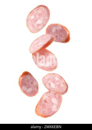 Set mit fliegender, frischer Wurst auf weißem Hintergrund Stockfoto