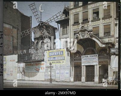 Paris (18. Arr.), Frankreich Le Moulin-Rouge Boulevard de Clichy und Werbung für den Luna Park, Stockfoto