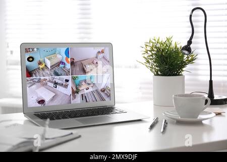 Laptop mit Blick von CCTV-Kameras. Heim-Sicherheitssystem Stockfoto