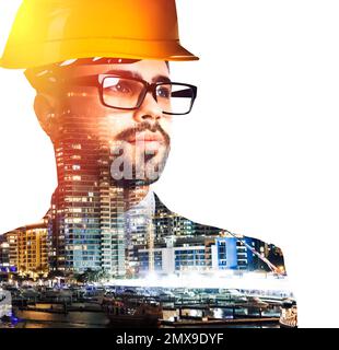 Doppelexposition des Industrietechnikers in Uniform- und Nachtstädten Stockfoto