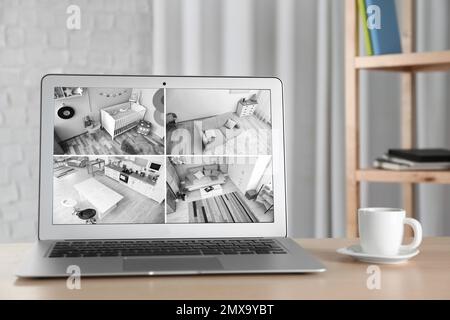 Laptop mit Blick von CCTV-Kameras. Heim-Sicherheitssystem Stockfoto