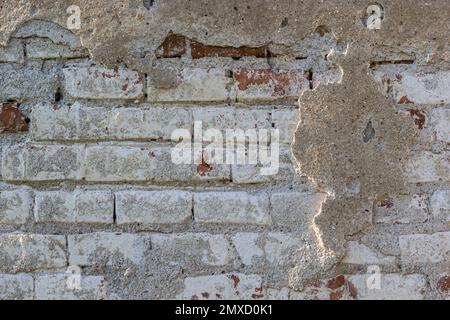 Alte Betonpflastersteine Wandtextur urbaner Hintergrund. Stockfoto