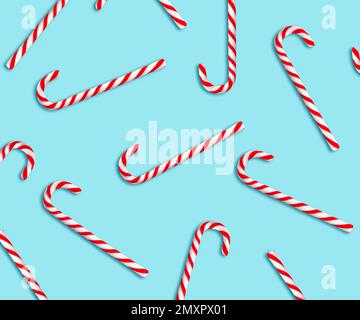 Muster weihnachtlicher Zuckerstangen auf hellblauem Hintergrund, Draufsicht Stockfoto