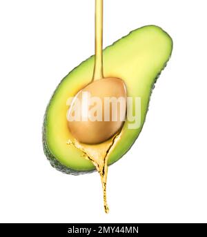 Avocadoöl und frische Früchte auf weißem Hintergrund Stockfoto