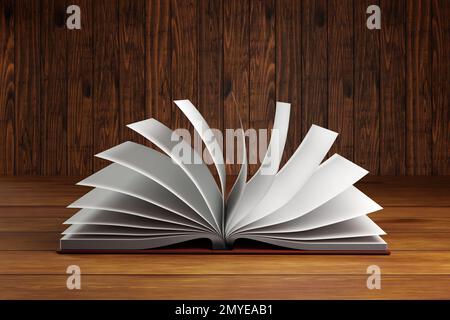Geöffnetes Buch mit umklappbaren Seiten auf einem Holztisch. Veranschaulichung des Konzepts von Lesen, Lernen und Bibliotheken Stockfoto