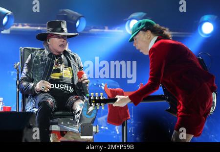 Singer Axl Rose, left, and AC/DC lead guitar player Angus Young perform ...