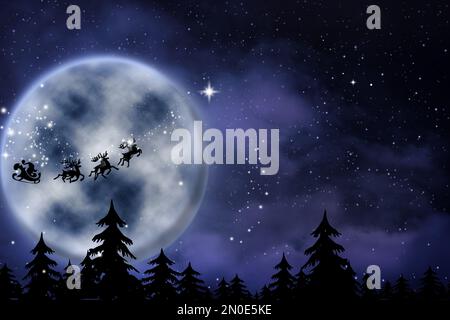 Magischer Weihnachtsabend. Weihnachtsmann mit Rentieren, die in Vollmondnacht am Himmel fliegen Stockfoto