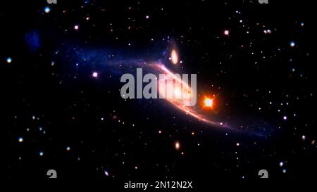 In diesem 10. Januar 2013 kombiniert das Composite Image der gigantischen Spiralgalaxie NGC 6872 Bilder des sichtbaren Lichts des sehr großen Teleskops des Europäischen Südlichen Observatoriums mit ultravioletten Daten des Galaxy Evolution Explorer (GALEX) der National Aeronautics and Space Administration (NASA) und Infrarotdaten, die vom Spitzer Space Telescope der NASA erfasst wurden. NGC 6872 ist 522.000 Lichtjahre breit, also mehr als fünfmal so groß wie die Milchstraße Galaxie. 2013 stellten Astronomen aus den USA, Chile und Brasilien fest, dass es sich um die größte bekannte Spiralgalaxie handelt, basierend auf Archivdaten f Stockfoto