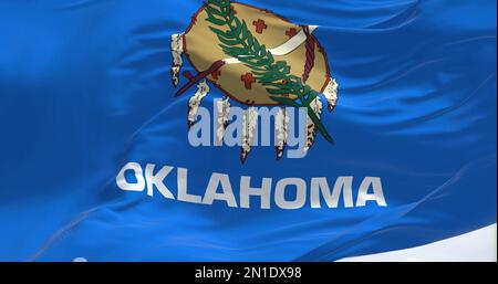 Nahaufnahme der Oklahoma Staatsflagge, die winkt. Oklahoma ist ein Bundesstaat in der südlichen Zentralregion der Vereinigten Staaten. Geriffelter Stoff. Strukturierter Backgr Stockfoto