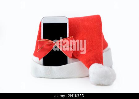 Nahaufnahme eines Weihnachtsgeschenks mit isoliertem Band auf weißem Hintergrund Stockfoto