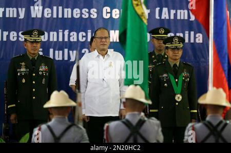 Outgoing Philippine Army Chief Lt. Gen. Romeo Tolentino, left, National ...
