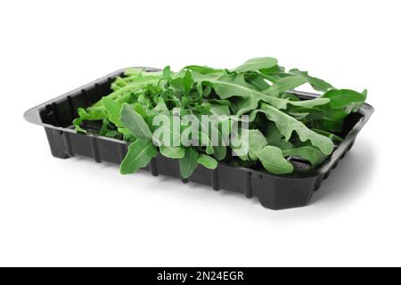 Ein Haufen frischer Rucola-Blätter, isoliert auf weiß Stockfoto