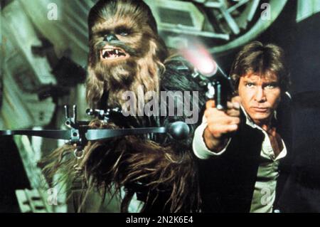 STAR WARS: EPISODE IV - Ein NEUER HOPE 1977 20. Century Fox Film mit Peter Mayhew als Chewbacca und Harrison Ford als Hans Solo Stockfoto