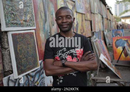 Kongolesischer Künstler besucht seine Plakate in Kinshasa Stockfoto