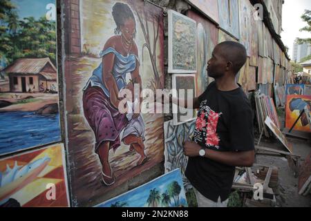 Kongolesischer Künstler besucht seine Plakate in Kinshasa Stockfoto