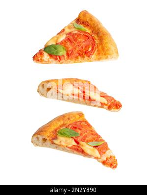 Stücke fallender Pizza auf weißem Hintergrund. Pizza margherita. Schweben. Fastfood. Stockfoto