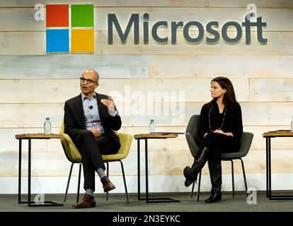 Satya Nadella, CEO of Microsoft, left, and Vrinda Kapoor, co-founder of