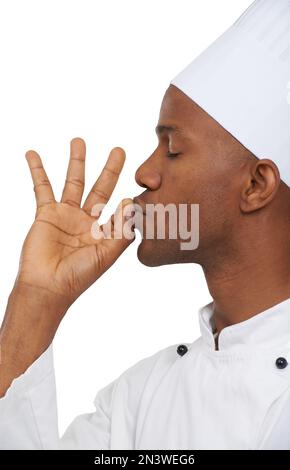 Magnifique. Profil eines afrikanischen Küchenchefs, der seine Hand perfekt küsst. Stockfoto