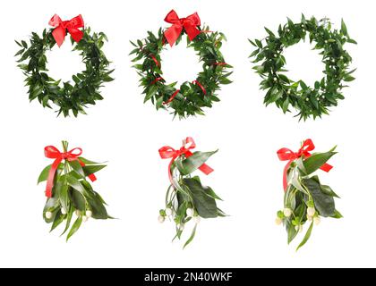 Set mit Mistelzweigen und Kränzen auf weißem Hintergrund. Traditionelle Weihnachtsdekor Stockfoto