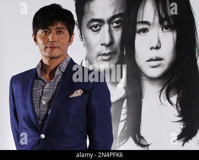 South Korean actor Jang Dong-gun poses during a press conference to promote his latest movie 'No Tears for the Dead' in Seoul, South Korea, Friday, May 30, 2014. (AP Photo/Ahn Young-joon)
