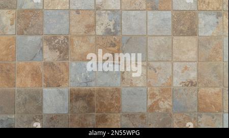 Graubraune, beige Wandmosaikfliesen Hintergrund Stockfoto