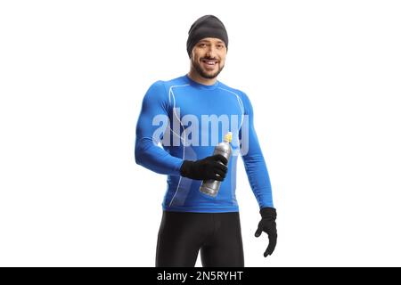 Den Mann in Laufkleidung und einen Hut mit einer Getränkeflasche auf weißem Hintergrund stecken Stockfoto