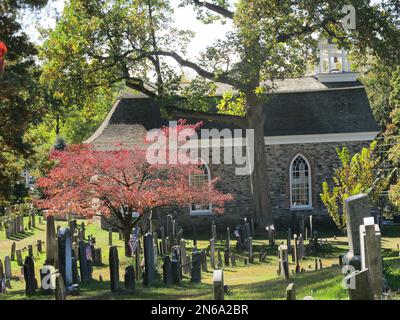 This photo of Oct. 18, 2013, shows the Old Dutch Church and Sleepy Hollow Cemetery in Sleepy Hollow, N.Y. The village of Sleepy Hollow is even busier than usual this Halloween, thanks to a new 'Sleepy Hollow' TV series inspired by the tale of the Headless Horseman. (AP Photo/Jim Fitzgerald)