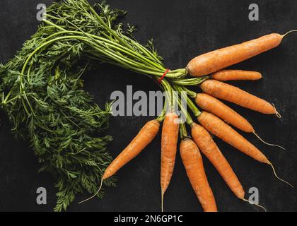 Top View-Anordnung frische Karotten. Auflösung und hochwertige Fotos Stockfoto