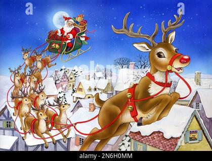 Rudolph und andere Rentiere ziehen den Weihnachtsmann im Schlitten über Schneedächer Stockfoto