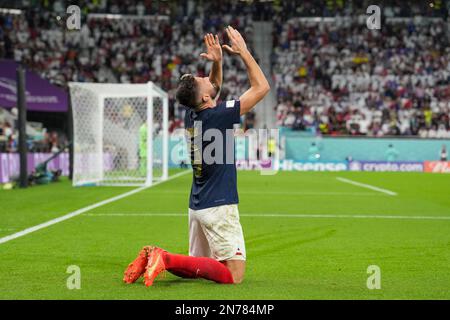 Olivier Giroud aus Frankreich feiert während des FIFA-Weltmeisterschafts-Katar-2022-Spiels zwischen Frankreich und Polen im Al Thumama Stadium ein Tor. Endstand: France 3:1 Polen. Stockfoto