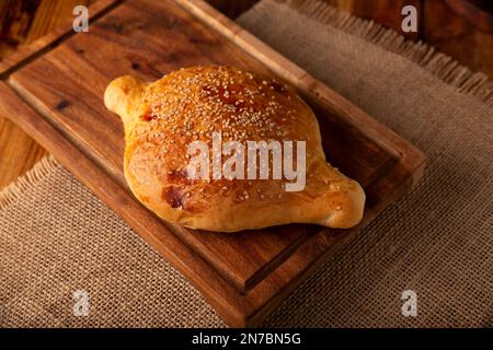 Cocol. Typisch mexikanisches Brot in Form eines Diamanten, etwas schwammig und trocken mit Anis- und Piloncillo-Aroma, manchmal mit Sesamsamen bedeckt. Stockfoto