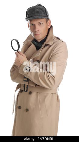 Männlicher Detective mit Lupe auf weißem Hintergrund Stockfoto