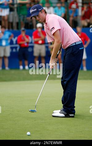FILE - In this Aug. 20, 2011 file photo, Webb Simpson putts on the 18th hole during the third round of the Wyndham Championship golf tournament in Greensboro, N.C. Golf's governing bodies have adopted a new rule that outlaws the putting stroke used by four of the last six major champions. The Royal & Ancient Golf Club and U.S. Golf Association announced Tuesday, May 21, 2013 that Rule 14-1b would start in 2016. The new rule will make it illegal to anchor the club against the body when making a golf stroke. (AP Photo/Chuck Burton, File)