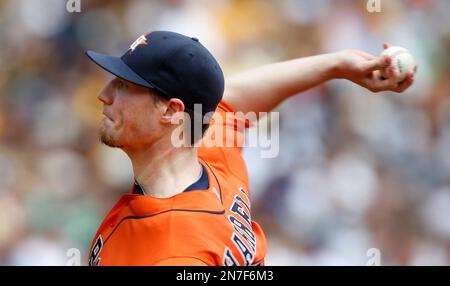 SEP 13 2012: Houston Astros pitcher Lucas Harrell #64 delivers a