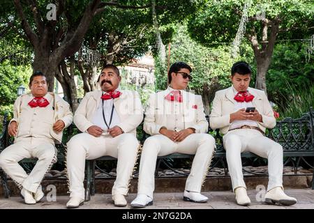 San Miguel de Allende Guanajuato Mexiko, historisches Zentrum Zona Centro, Jardin Allende plaza Principal, Mitglieder Mariachi Band Musiker, t Stockfoto