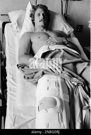 Atlanta Falcons quarterback Steve Bartkowski rests his head in a towel on  the sidelines during NFL game agianst San Francisco played at Atlanta  Stadium, Dec. 15, 1975. Bartkowski, who will marry airline