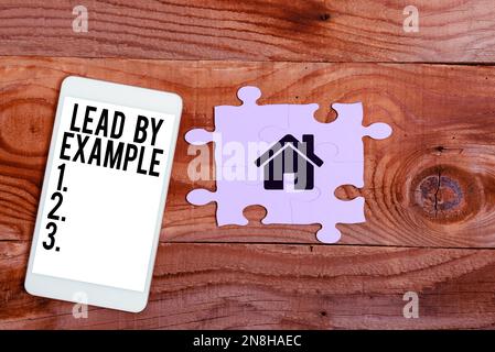 Handschriftliche Texte führen durch Beispiel. Business-Schaufenster Mentor werden Leader Befolgen Sie die Regeln Geben Sie Beispiele Coach Stockfoto