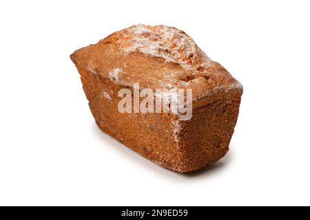 Ein Cupcake mit Rosinen auf weißem Hintergrund. Muffin. Stockfoto