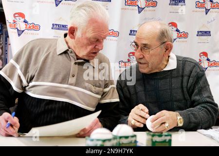 In this April 10, 2013 photo, David Kohler, president and chief executive  of SCP Auctions, looks over a New York Yankees jersey purportedly worn by  Reggie Jackson during the 1977 World Series