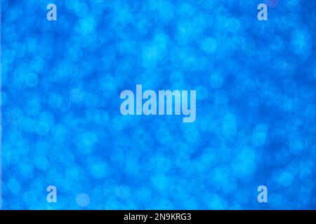 Abstrakter blauer Hintergrund mit rundem Bokeh Stockfoto