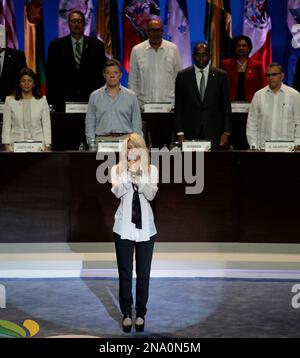 Colombia's pop star Shakira sings her country's national anthem