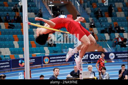 Astana, Kasachstan. 12. Februar 2023. Wang Zhen aus China tritt beim High-Jump-Finale der Männer bei den 10. Asian Indoor Athletics Championships in Astana, Kasachstan, am 12. Februar 2023 an. Kredit: Kalizhan Ospanov/Xinhua/Alamy Live News Stockfoto