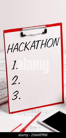 Schild mit Hackathon. Ein Wort, das bei einer Veranstaltung geschrieben wurde, bei der eine große Anzahl von Menschen an der Programmierung beteiligt ist Stockfoto