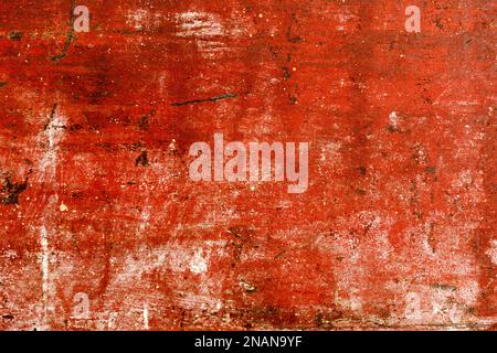 Alte bemalte Holz mit Angebrochen rote Lackierung. Grunge style Hintergrund. Stockfoto