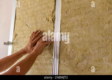 Interior repair, construction and renovation. Metal profiles and fasteners, stone wool insulation. Stockfoto