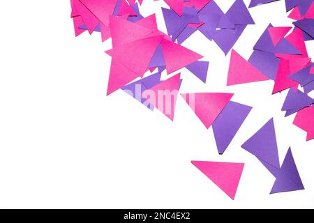 Ein rosafarbenes violettes geometrisches Papierdreieck für Hintergrund Stockfoto
