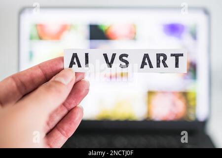 AI vs. Art Text vor dem Notebook Bokeh mit unscharfen Bildern, Konzept der künstlichen Intelligenz Erstellung generativer Inhalte basierend auf Kunst von Stockfoto