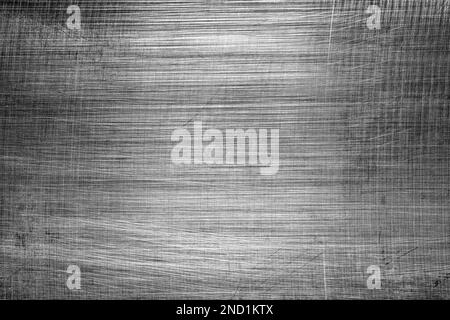 Einfarbige Textur aus glänzend zerkratztem Metall. Abstrakter Hintergrund für Design. Stockfoto