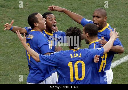 Brazil players, front row from left, Ramires, Daniel Alves, Kaka, Robinho,  Michel Bastos, back row from left, Lucio, Julio Cesar, Luis Fabiano, Juan,  Maicon, and Gilberto Silva pose for a team photo